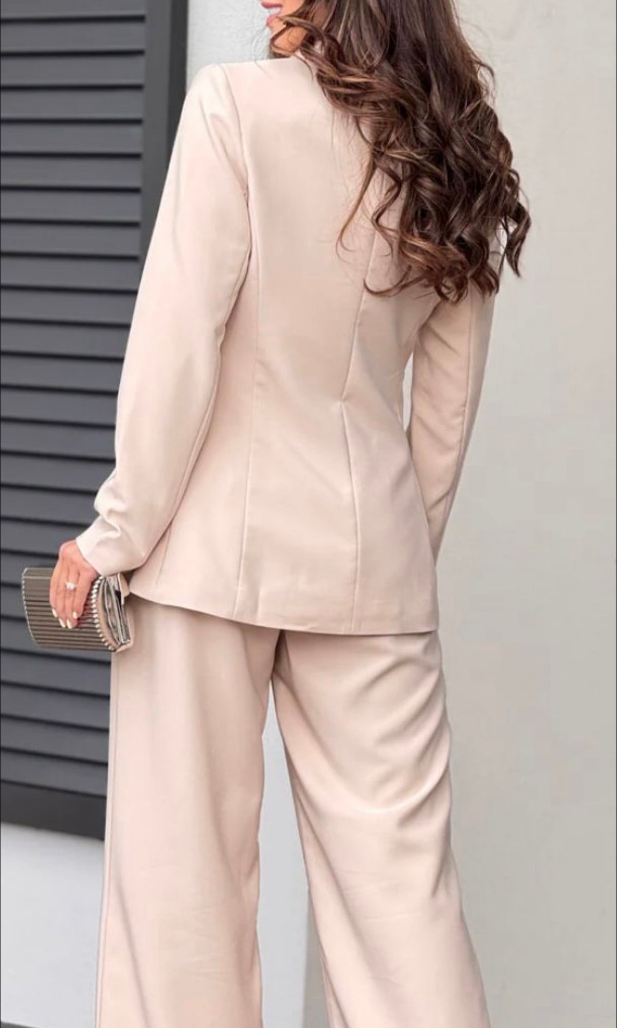 Two-piece outfit: beige trousers and jacket