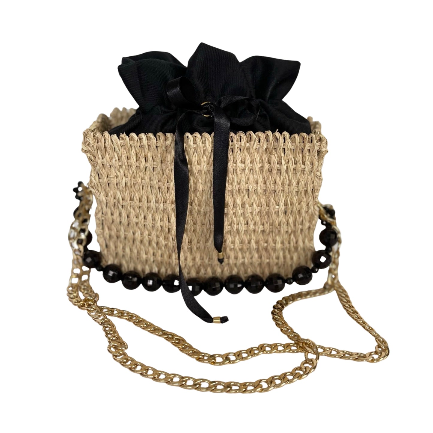 H. Pearl bag made in iraca palm with pearl strip and lined in black silk