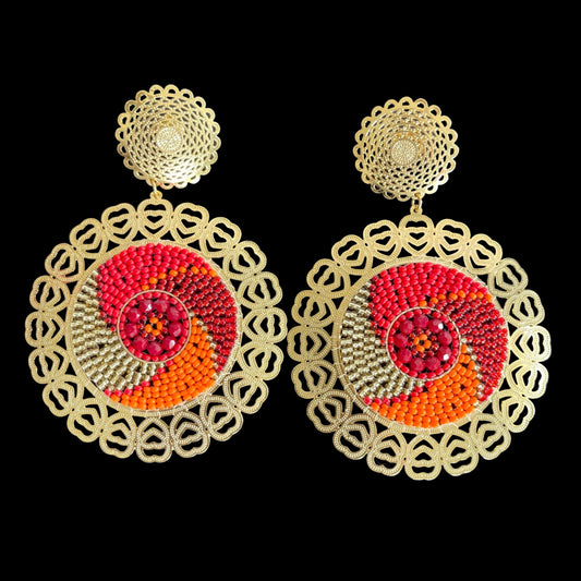 E. Large earrings designed in 24k gold plated bronze and red beads