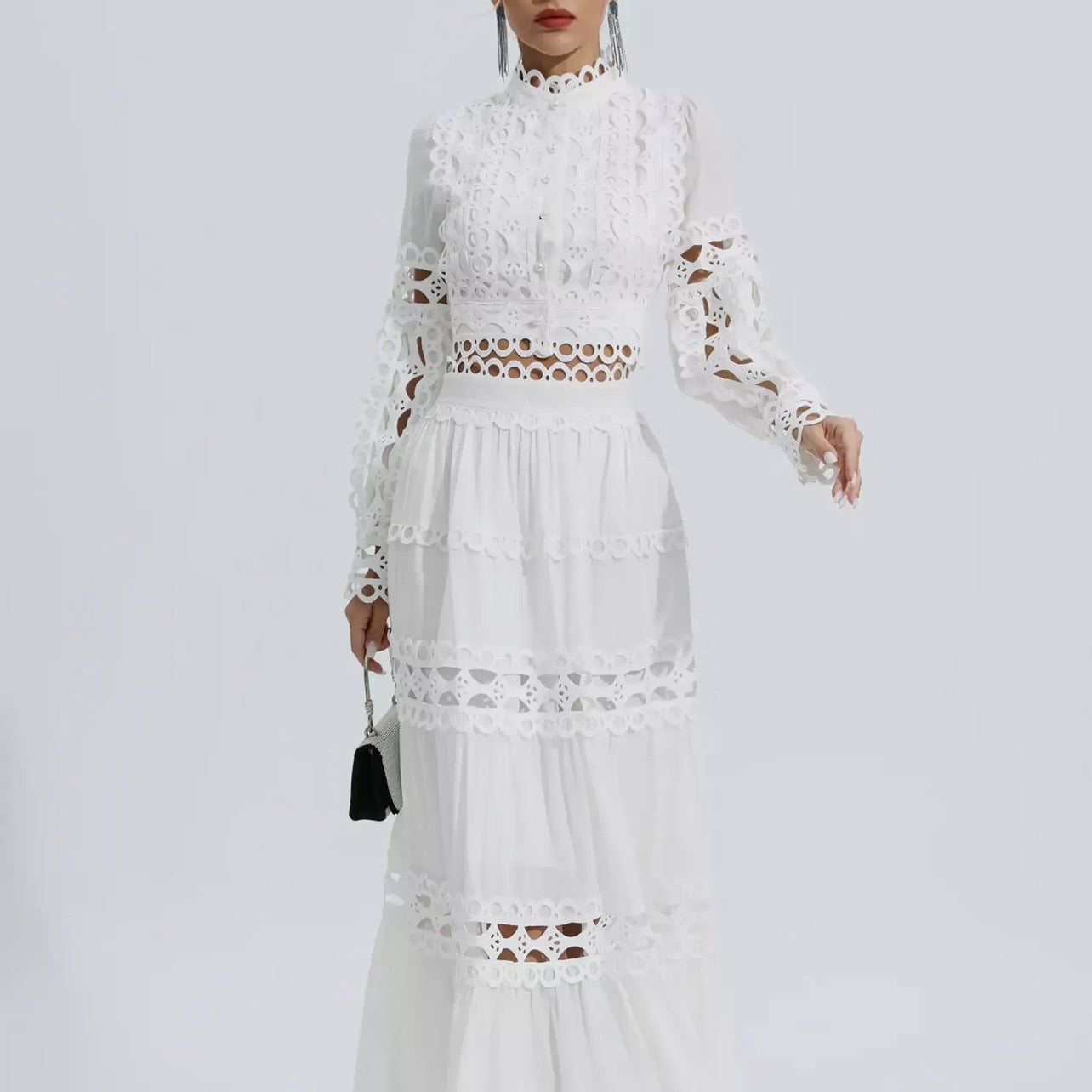 Two-piece white outfit with a skirt