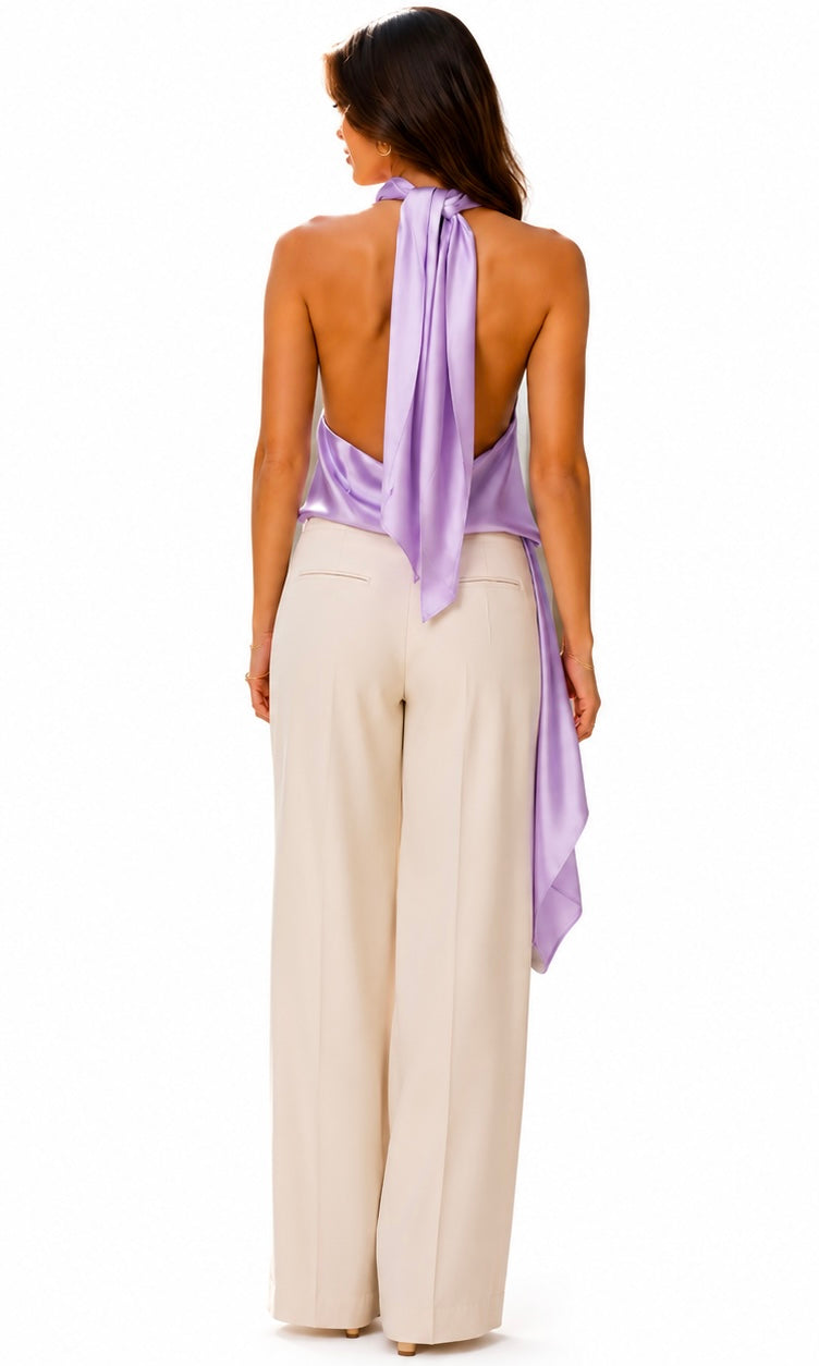Top-Dress in lavender features a draped halter neckline and an asymmetrical hemline.