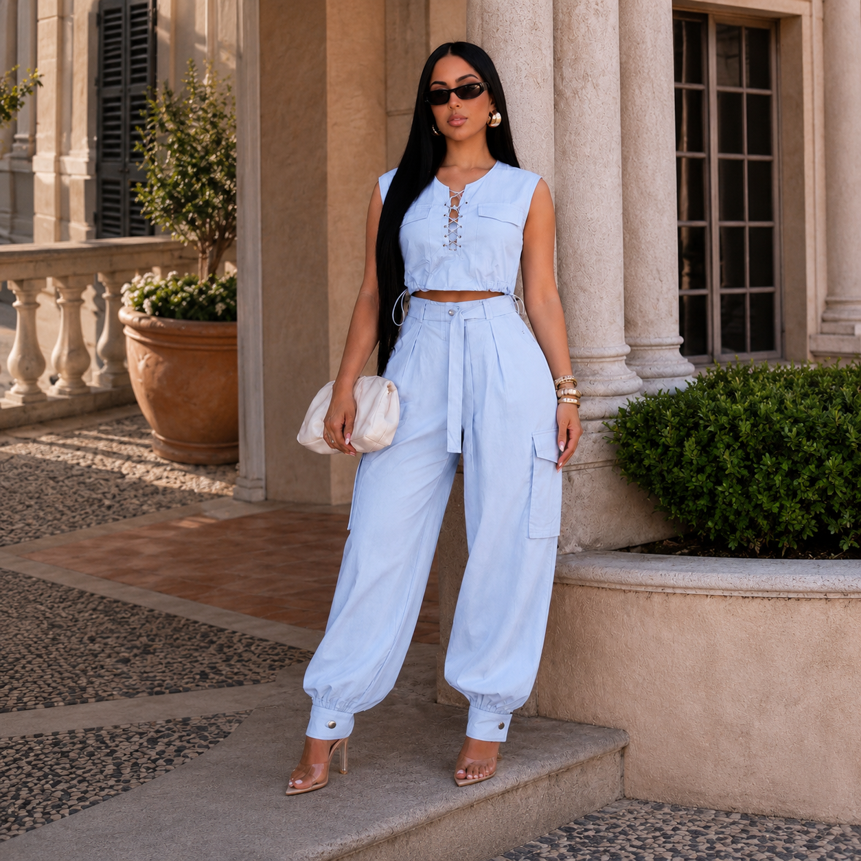 Light blue Jogger Pant Set featuring a lace-up sleeveless crop top and matching cargo jogger pants.
