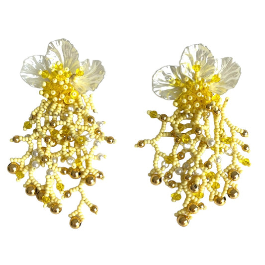 04. White half flower earrings with yellow strips